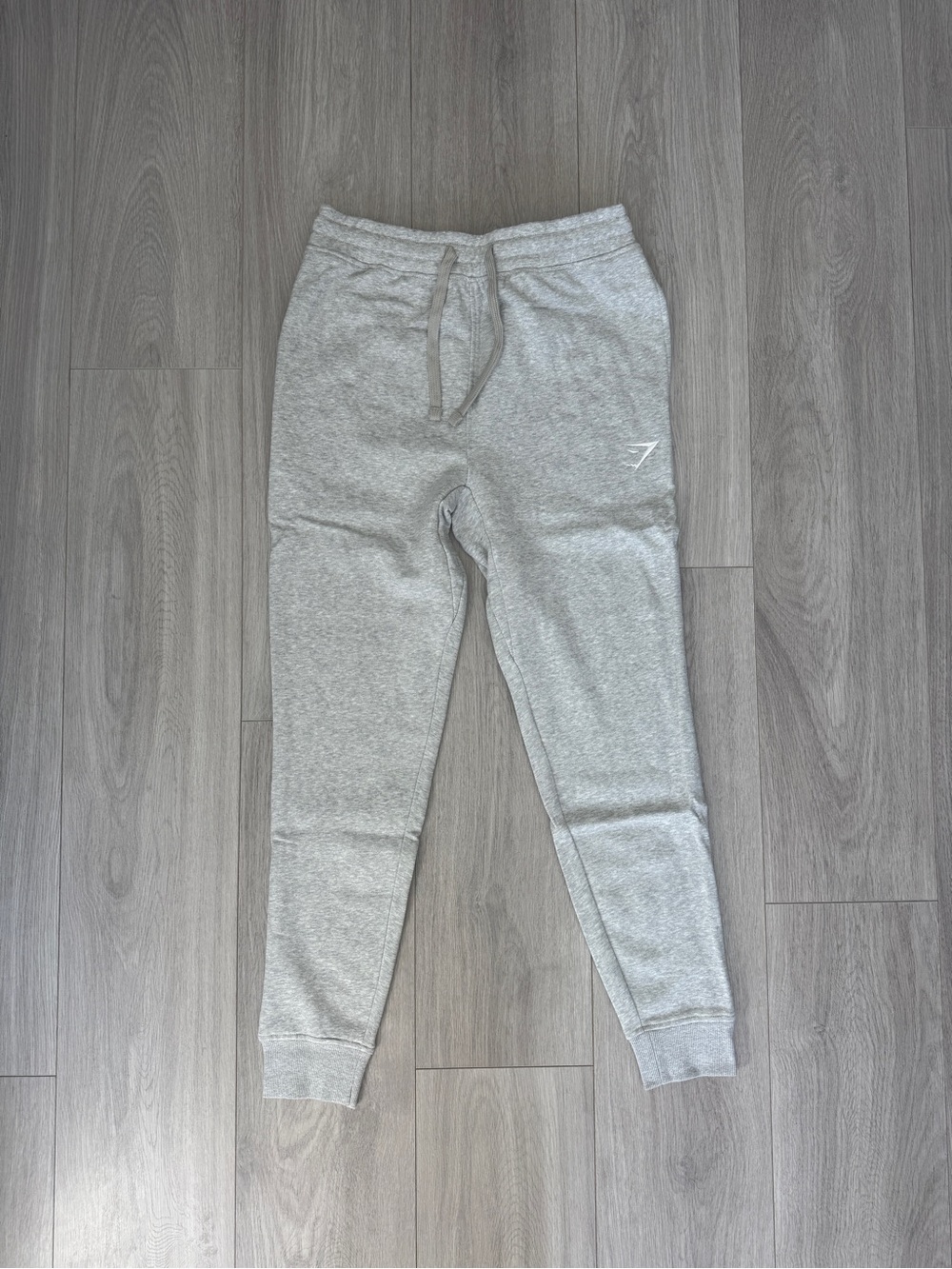 Mens Gymshark Crest joggers in light grey